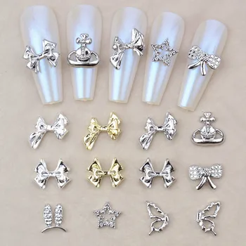 10 pcs 3D decoración de uñas de arte oro de la aleación de plata de la mariposa diseño de arco efecto suministros de manicura de uñas de la joyería V895-906